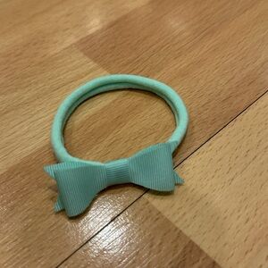 Pretty little mint green newborn bow